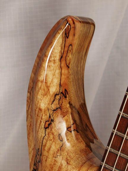 Long horn and scooped cutaway detail