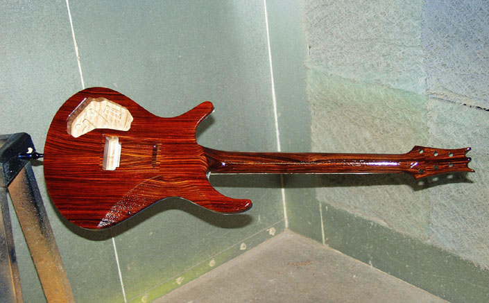 A Driskill body hanging in the paint booth